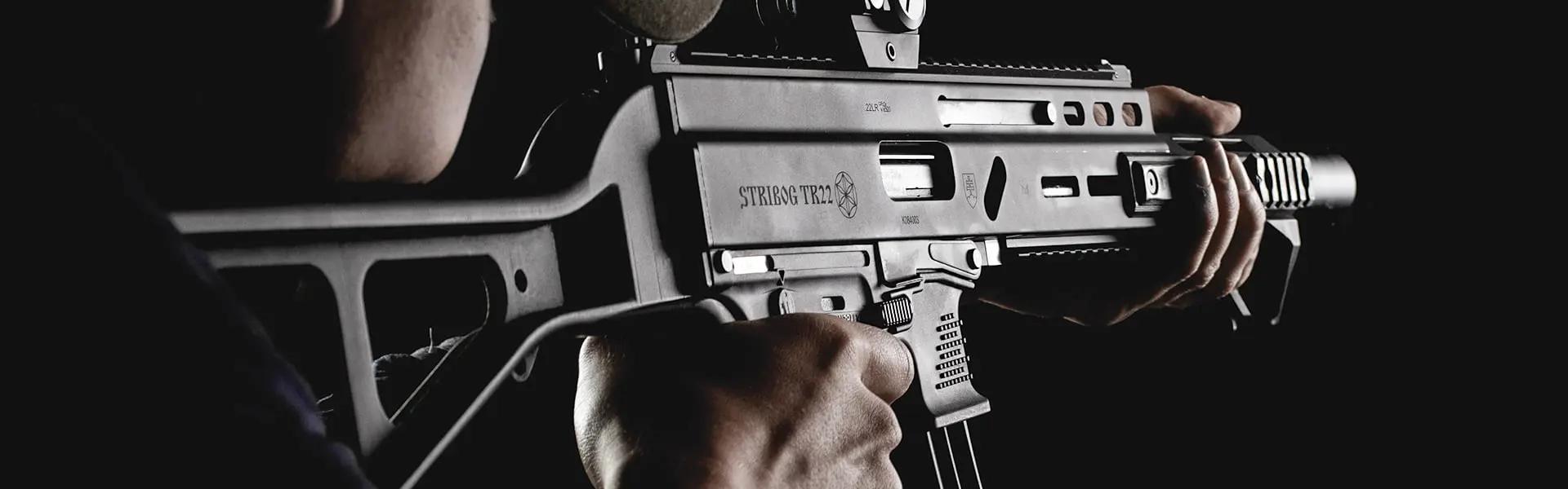 Man aiming Stribog TR22 22LR Semi Auto Rifle